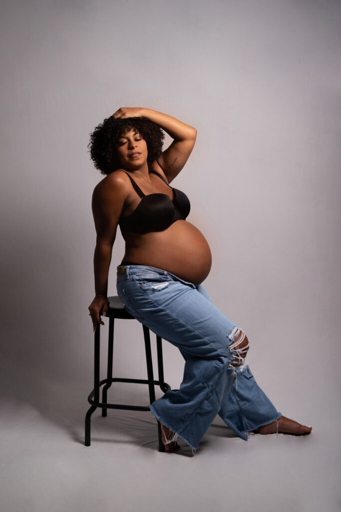 Charlotte maternity photographer captures pregnant mom glowing in natural light.
